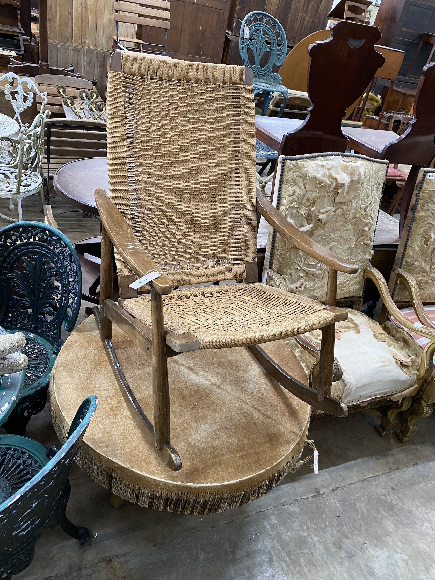A 1960's Papercord teak rocking chair, width 62cm, height 96cm